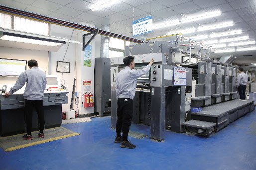 Heidelberg XL 75 four-color press at Much Printing